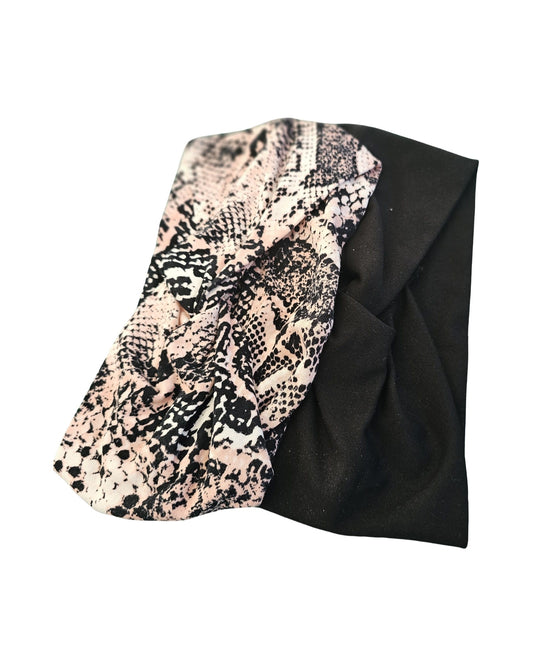 Black and patterned fabric on a white background