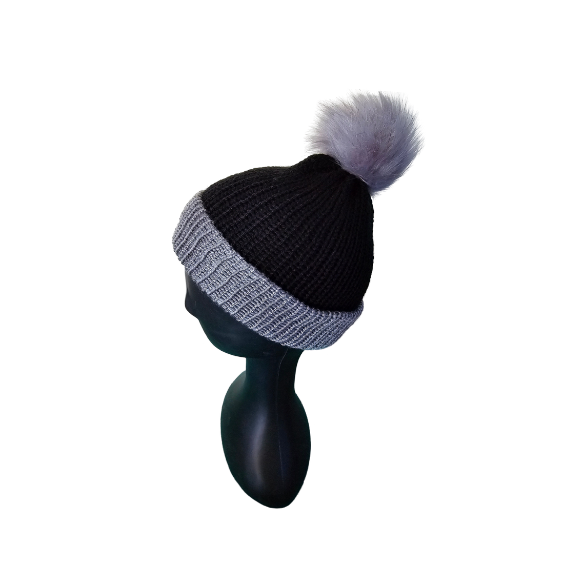 Two tone knitted beanie with pom pom side view