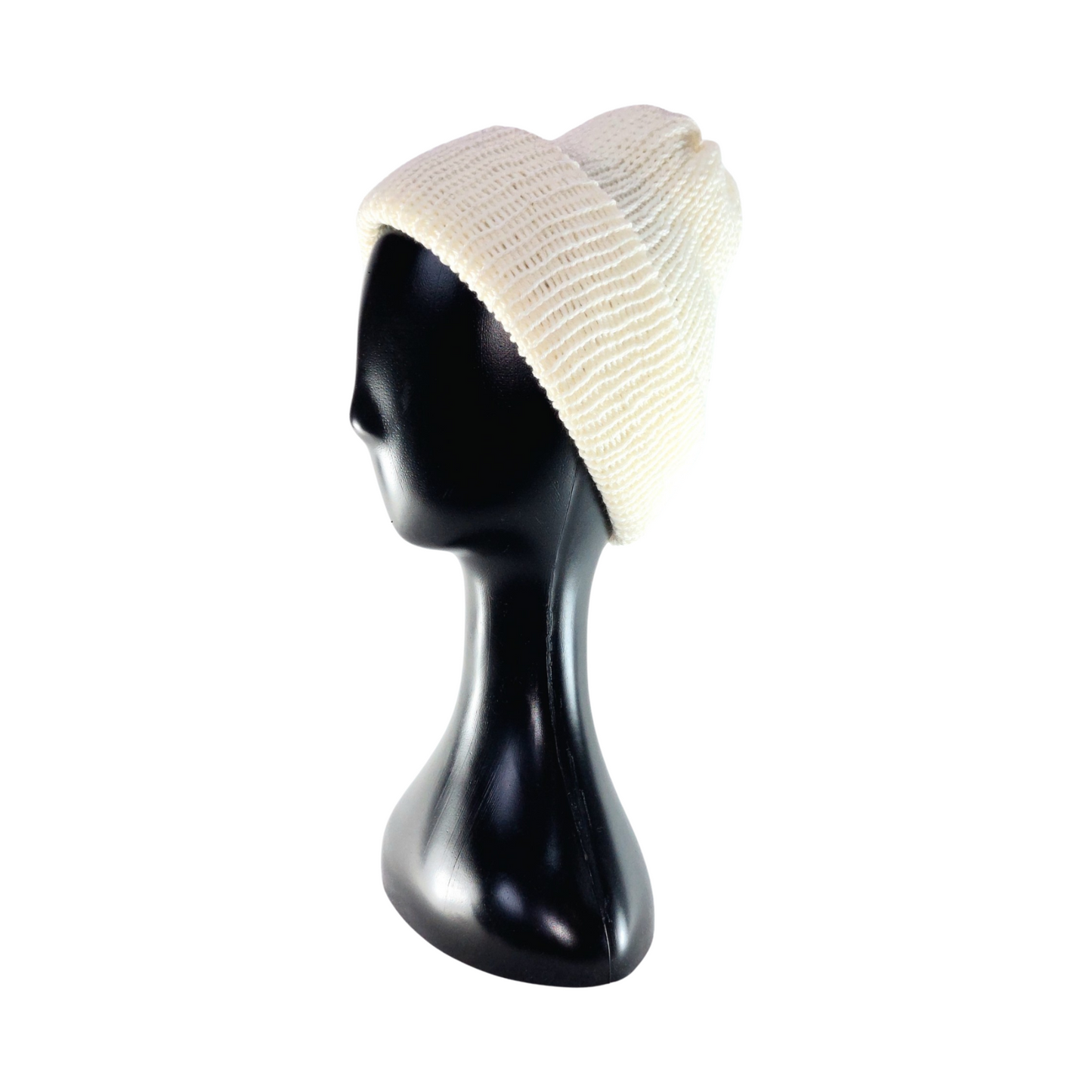 White knit beanie on a black mannequin head against a white background