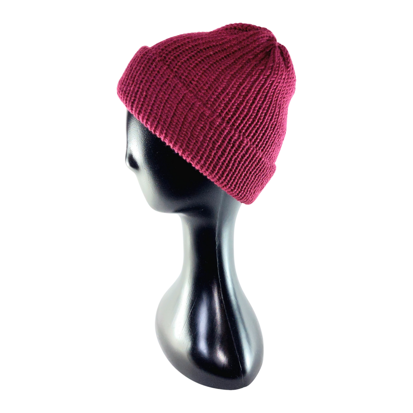 Maroon knit beanie on a black mannequin head against a white background