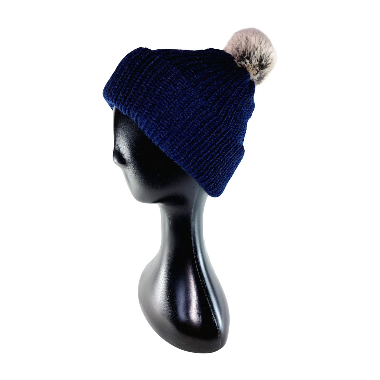 Blue knit beanie with a gray pom-pom on a mannequin head against a white background