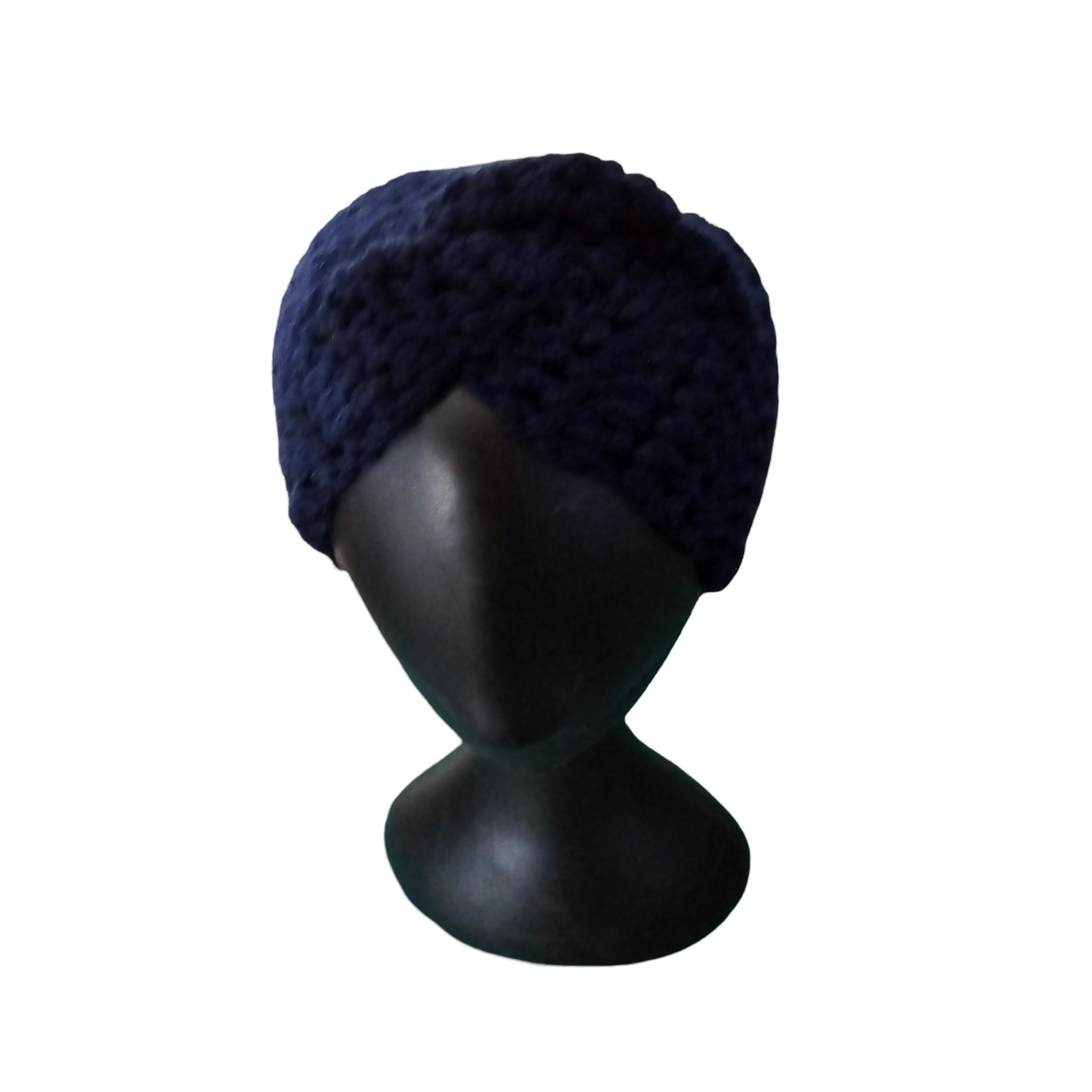 Navy blue knitted turban on a black mannequin head against a white background