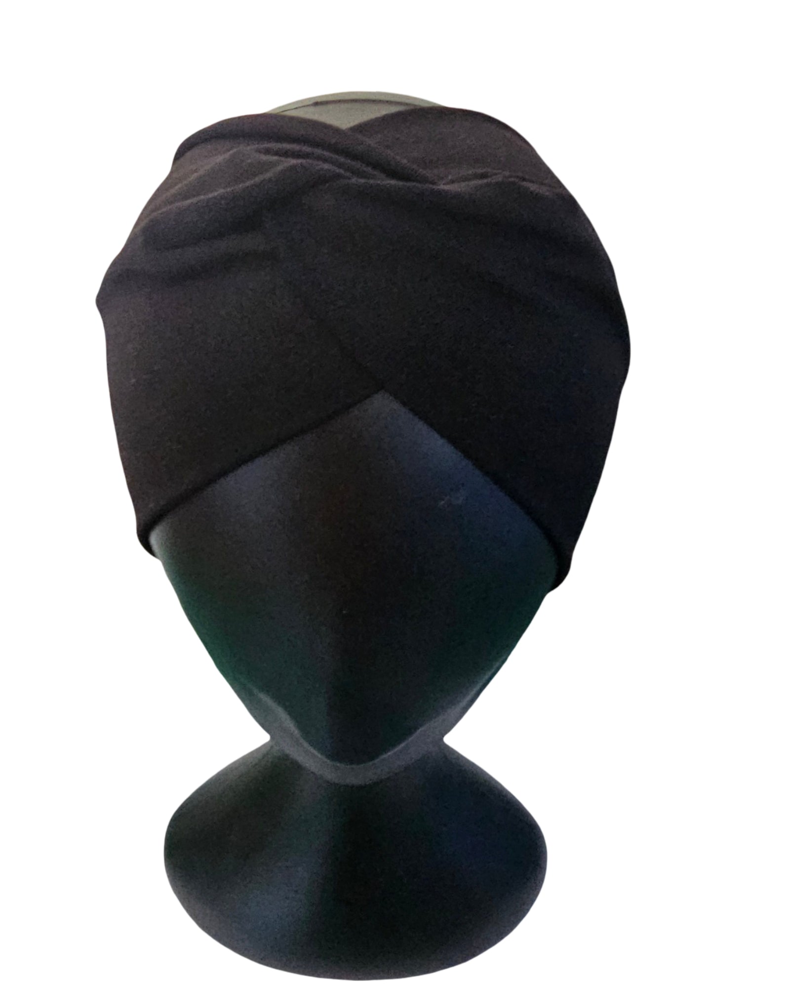 Black turban on a mannequin head against a white background
