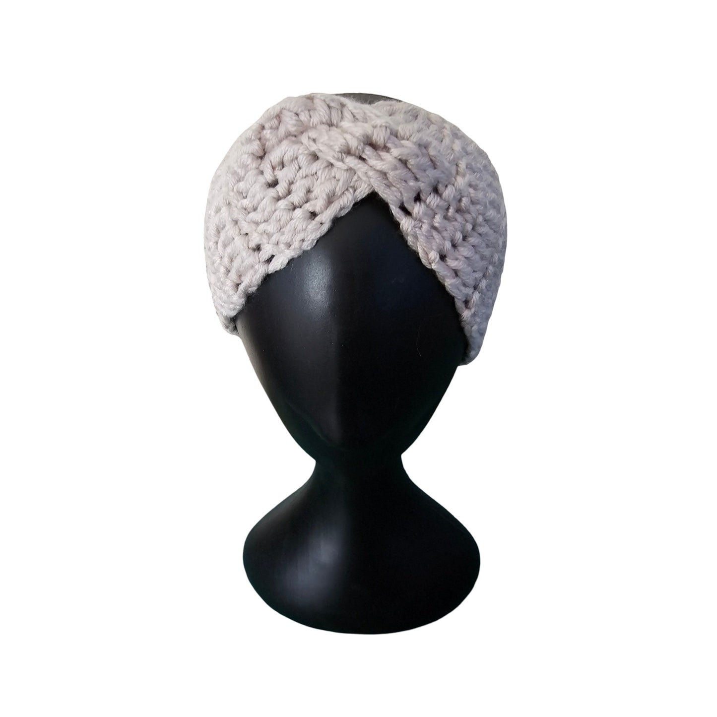 Knitted headband on a black mannequin head against a white background