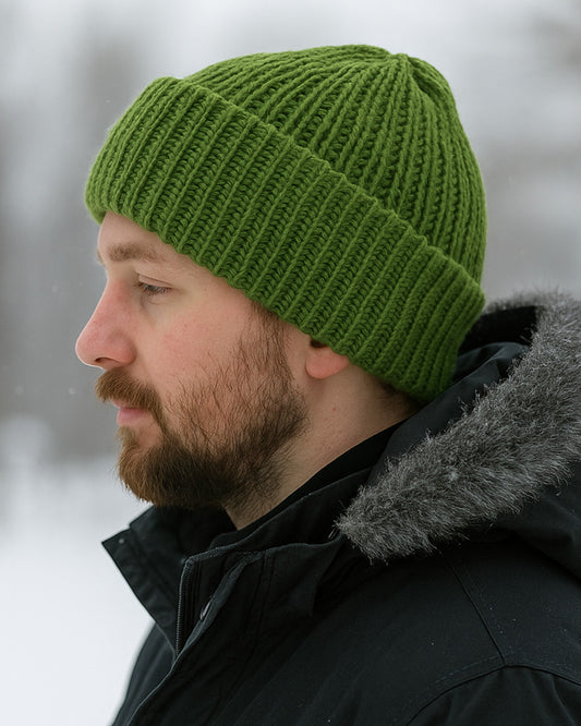 Model wearing a knitted beanie