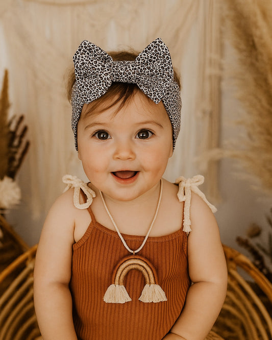 Baby Bow Headband - front view on baby