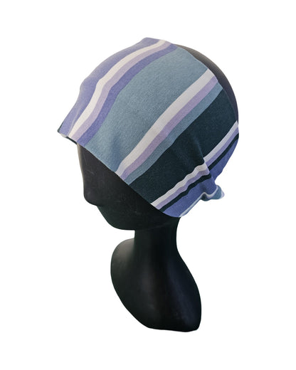Striped Woman's knotted headband on a mannequin head against a white background