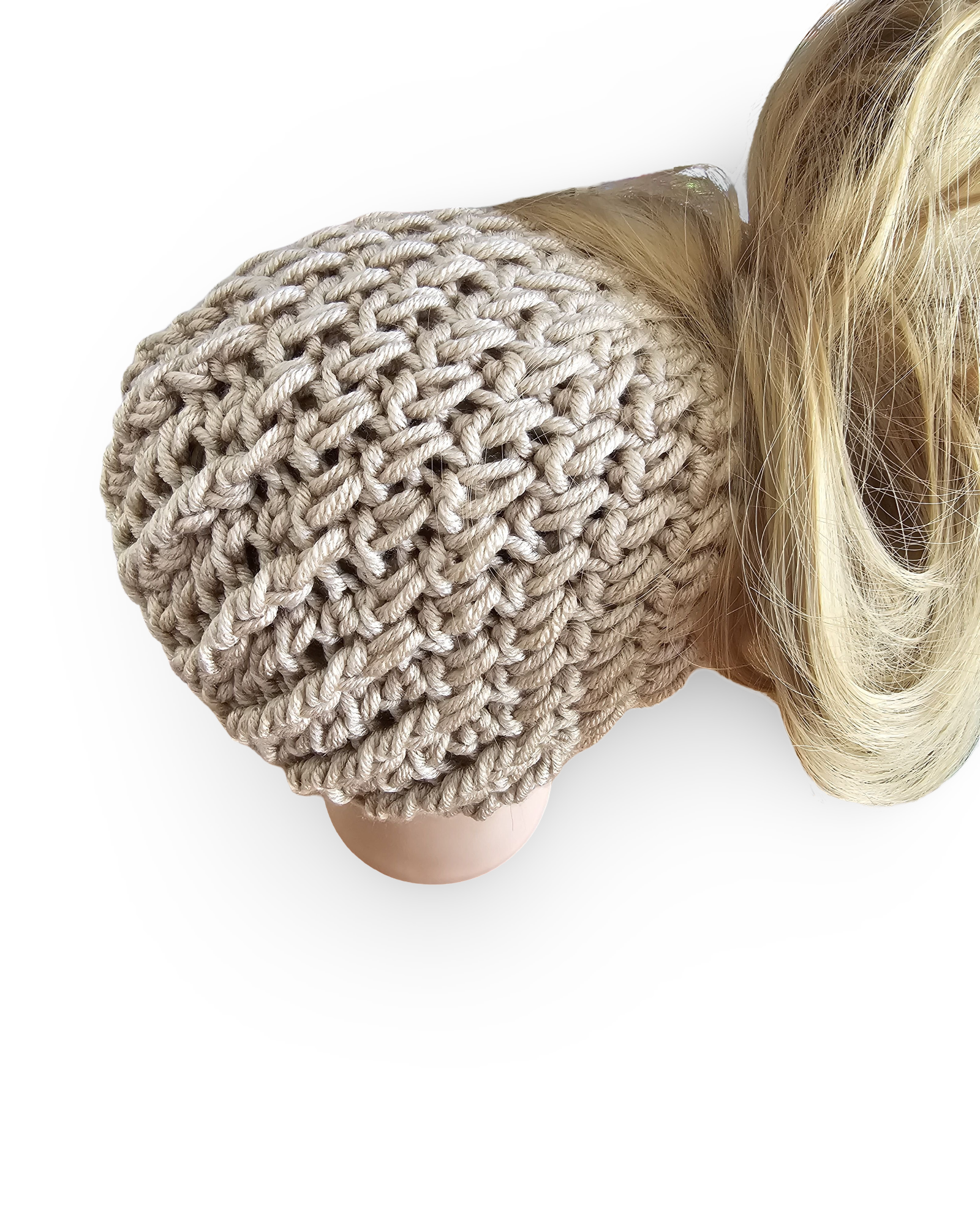 Knitted beige beanie on a mannequin head with blonde hair against a white background