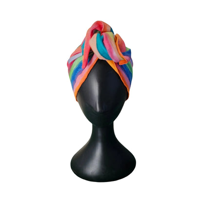 Colorful easy to style wire headband on a black mannequin head against a white background front view